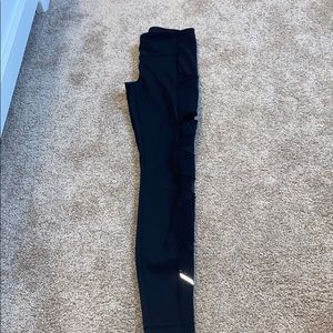 Lululemon leggings size 4(hole on side)